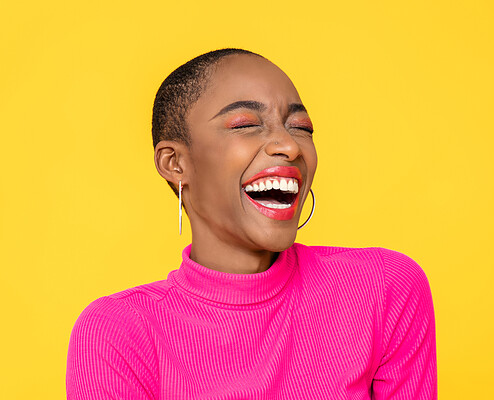 Happy,Optimistic,African,American,Woman,In,Colorful,Pink,Clothes,Laughing
