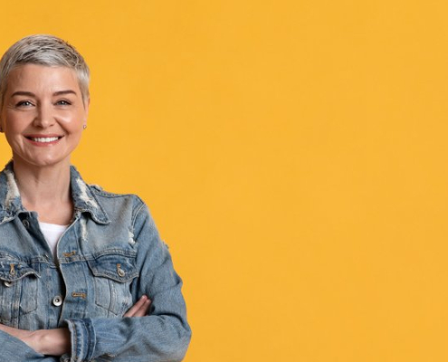 Portrait of a pretty older woman smiling at the camera